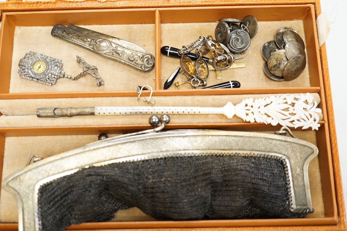 A quantity of assorted antique and later costume jewellery to include a silver and Marcasite ladies fob watch, a collection of cufflinks, brooches and a pair of drop earrings with screw backs